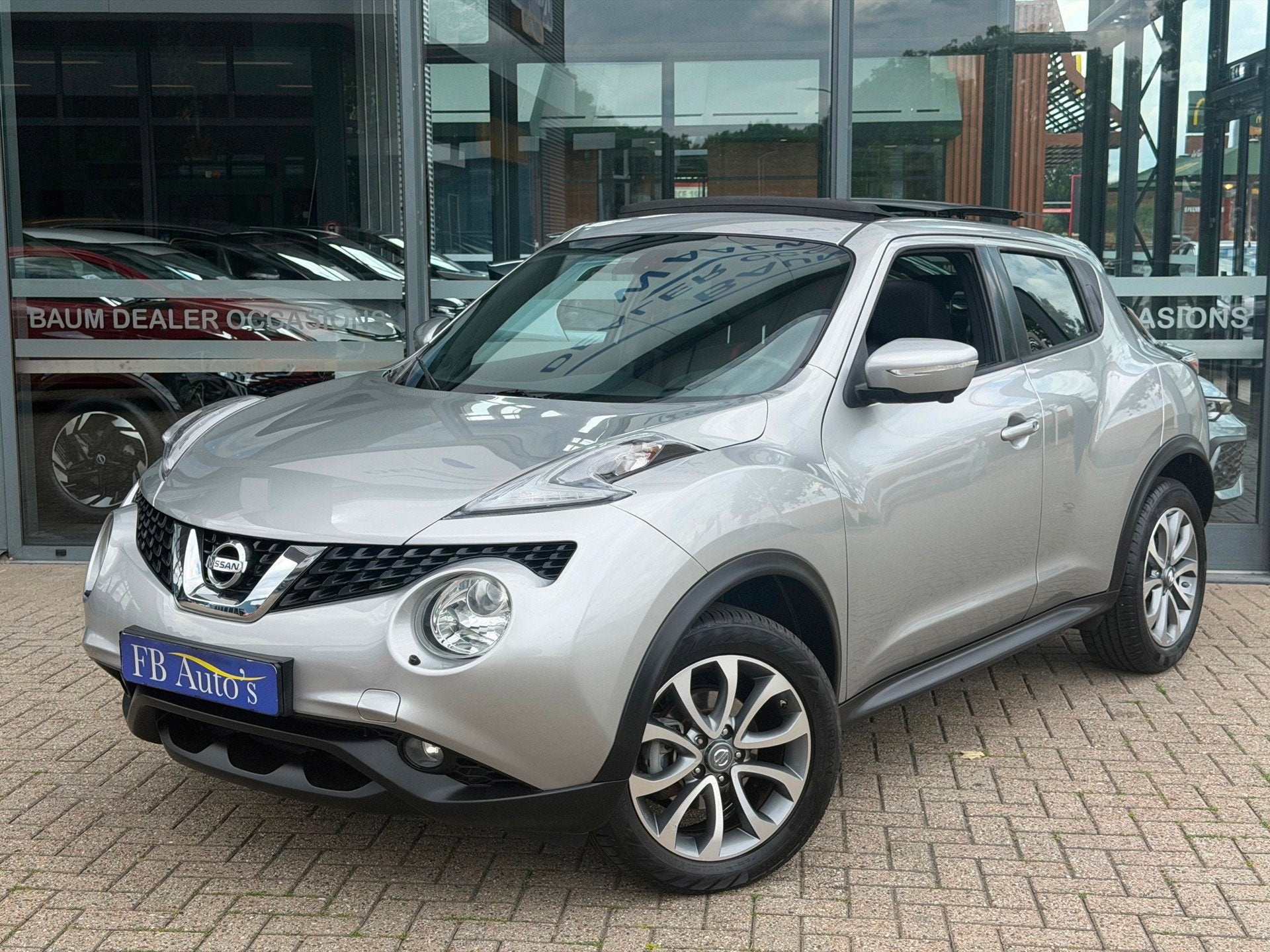 Nissan Juke 1.2 DIG-T S/S Tekna Airco Lmv Cruise Navi Camera, Auto's, Nissan, Voorwielaandrijving, Gebruikt, Zwart, 116 pk