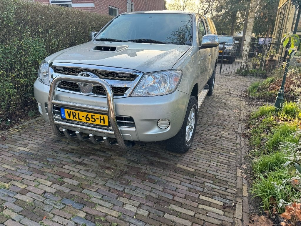 Toyota Hilux 2007, Auto's, Stof, Euro 4, Zilver of Grijs, Metallic lak