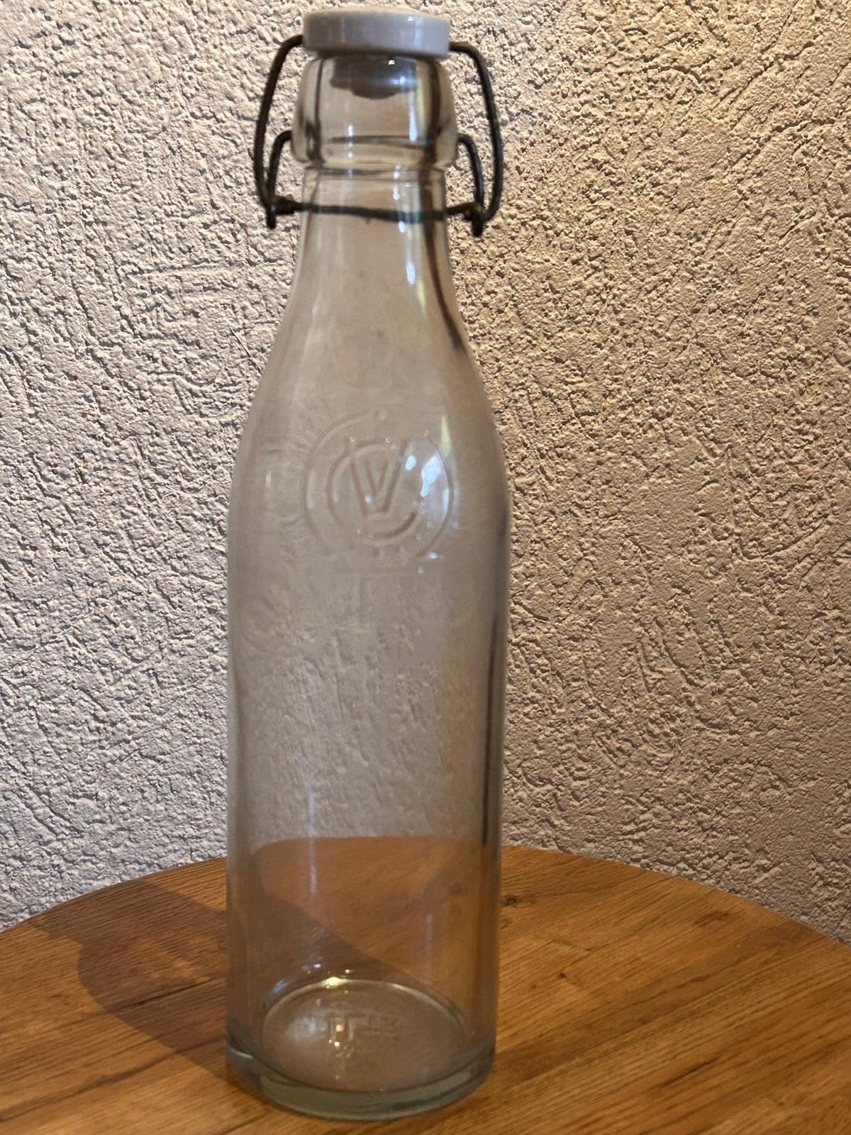 Waterfles merk V, Ophalen