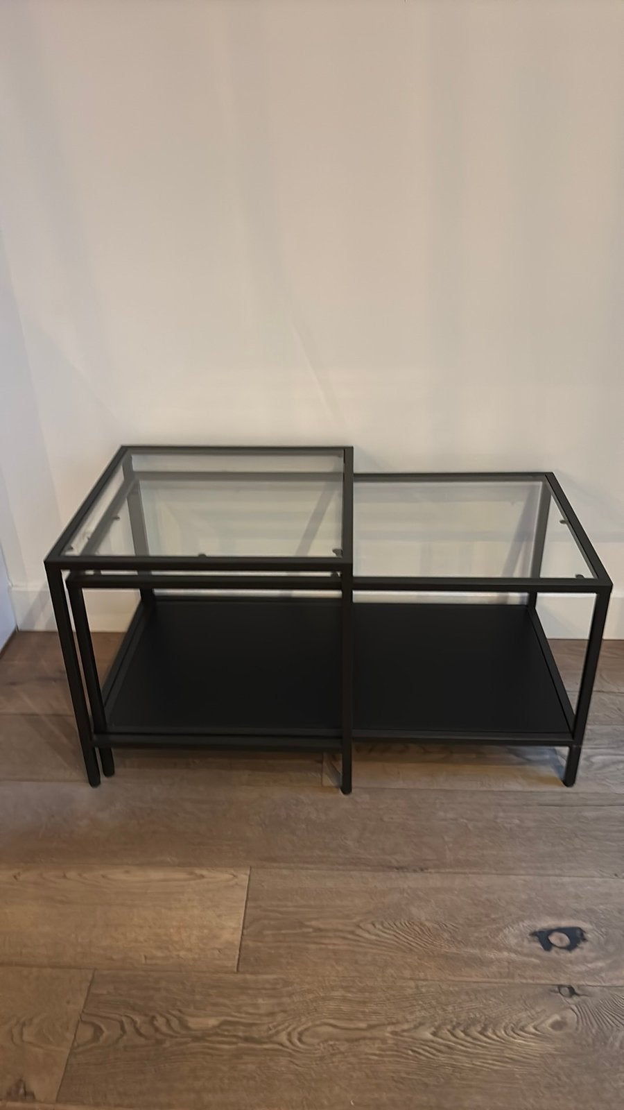 Salontafel zwart/glas VITTSJÖ, Huis en Inrichting, Ophalen, 100 tot 150 cm, Glas, Zo goed als nieuw