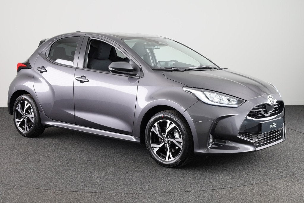 Toyota Yaris Hybrid 115 Dynamic *NIEUW* | DIRECT Leverbaar!, Auto's, Toyota, Stof, Zwart, 116 pk, 1490 cc