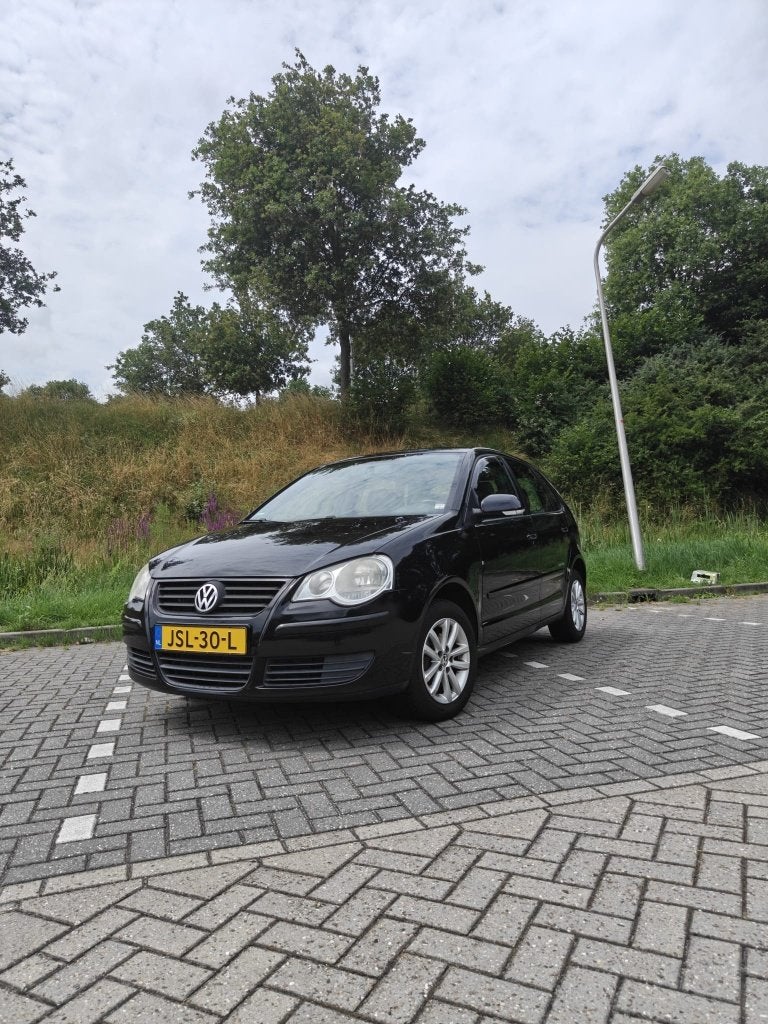 Volkswagen Polo 1.4 16V 59KW 2009 Zwart, Voorwielaandrijving, Stof, Zwart, 4 cilinders