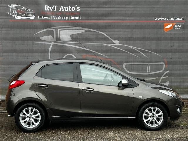 Mazda 2 1.3 TS Plus 1ste eigenaar,Airco,Stoelverwarming,Park, Auto's, Voorwielaandrijving, Euro 5, Stof, Gebruikt
