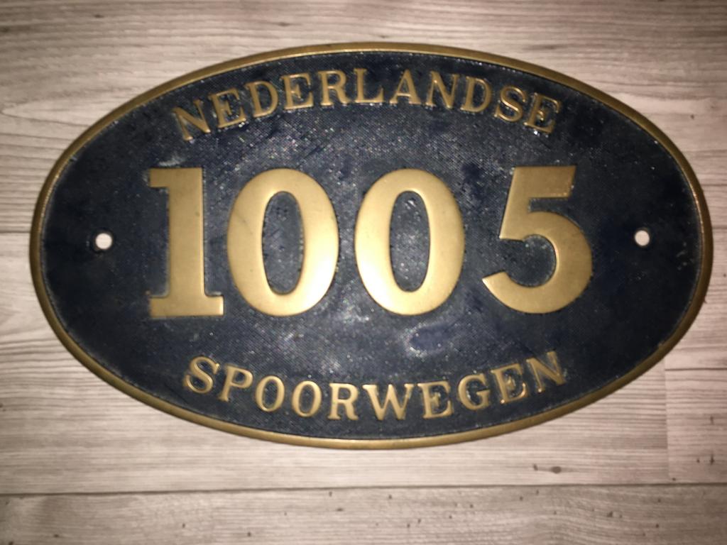 Te koop gevraagd NS nummerplaten, Ophalen
