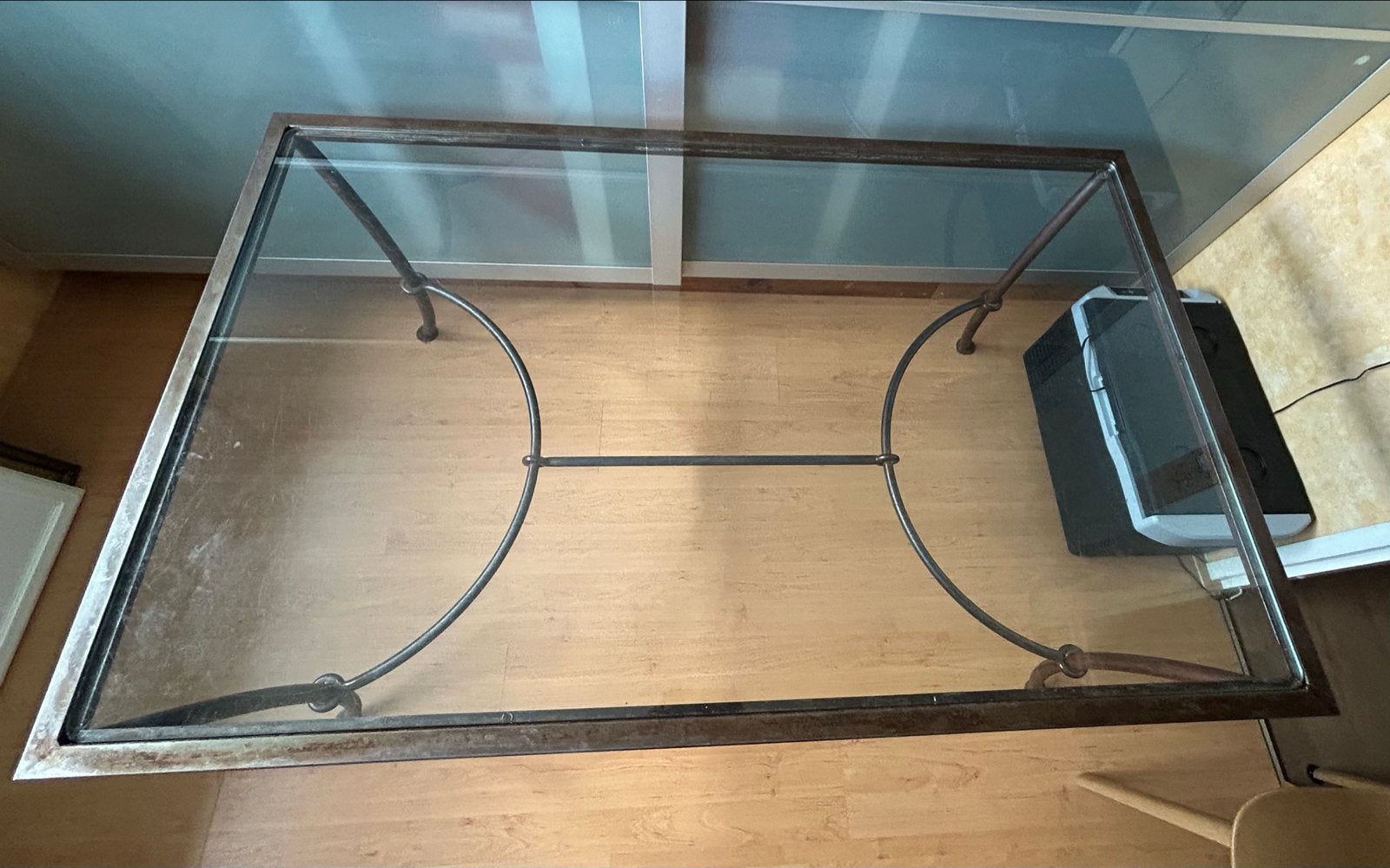 Glazen eettafel met metalen frame, Ophalen, Gebruikt, 100 tot 150 cm, 50 tot 100 cm