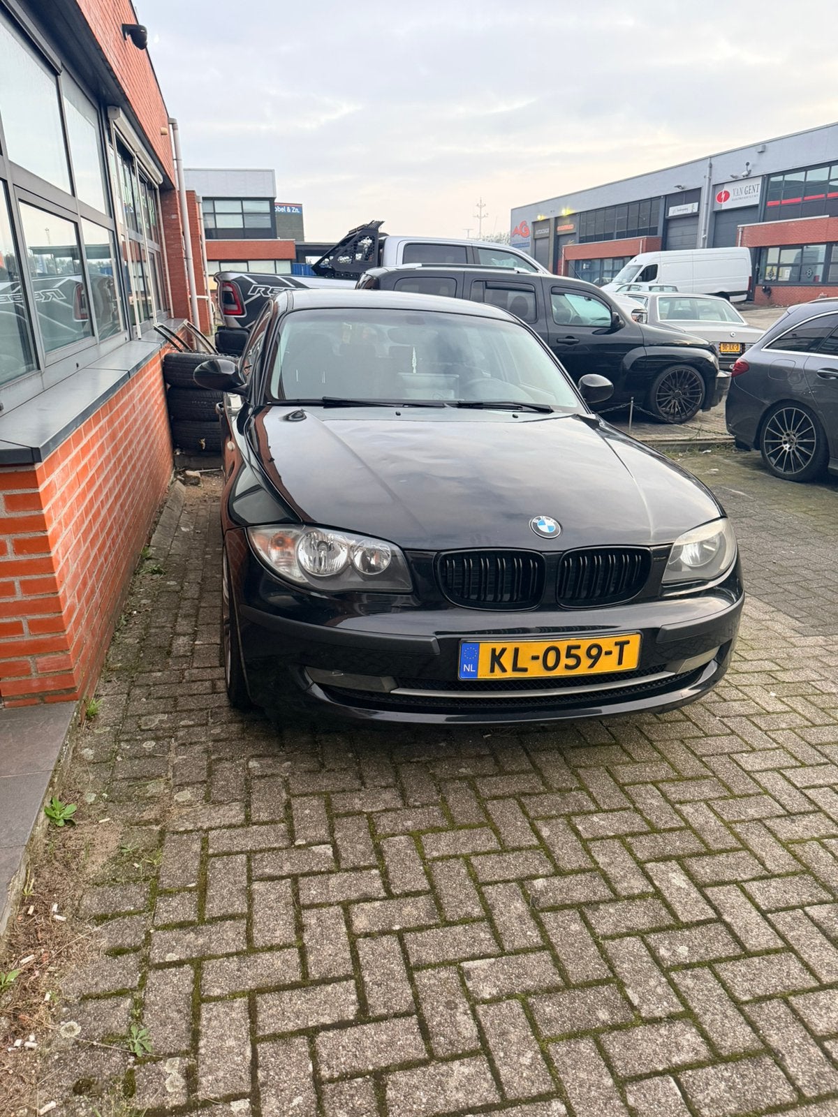 BMW 1-Serie 2.0 116I 5DR 2009 Zwart, Auto's, 1-Serie, 1995 cc, Zwart, 4 cilinders