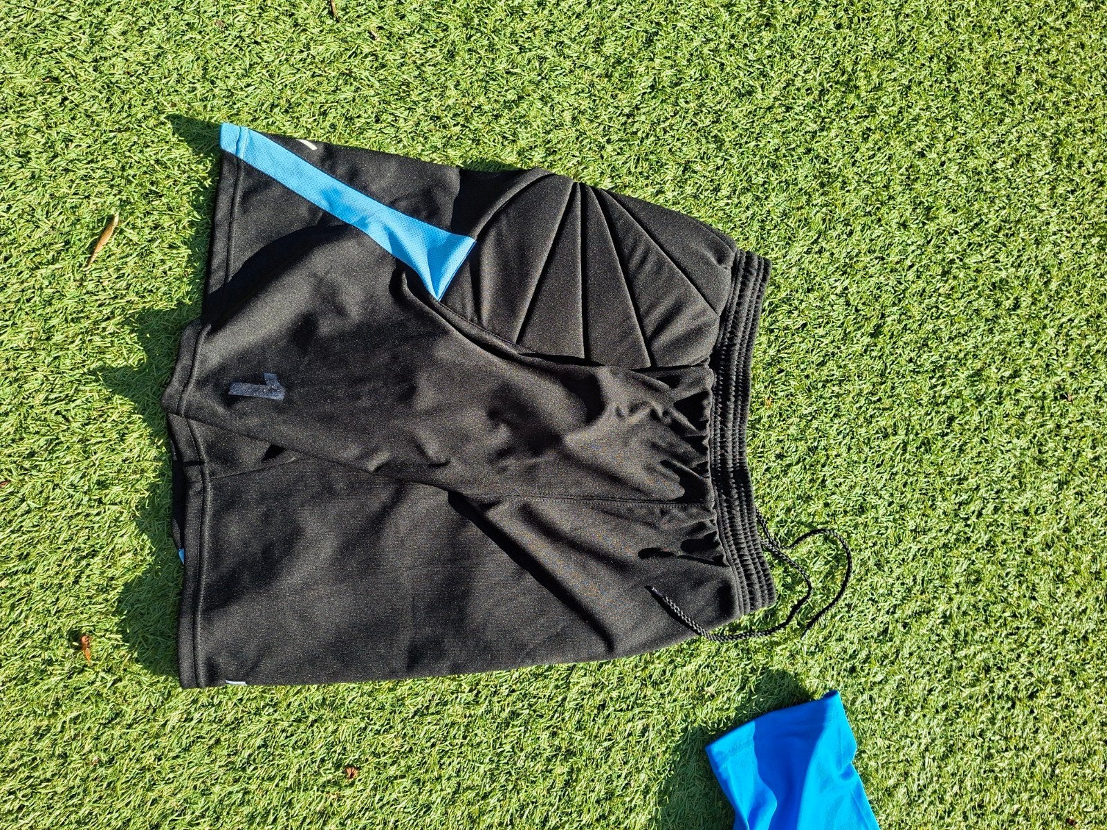 Macron keepersbroekje met bescherming - Zwart/Blauw, Kleding | Heren, Maat 48/50 (M), Zwart, Ophalen of Verzenden, Voetbal