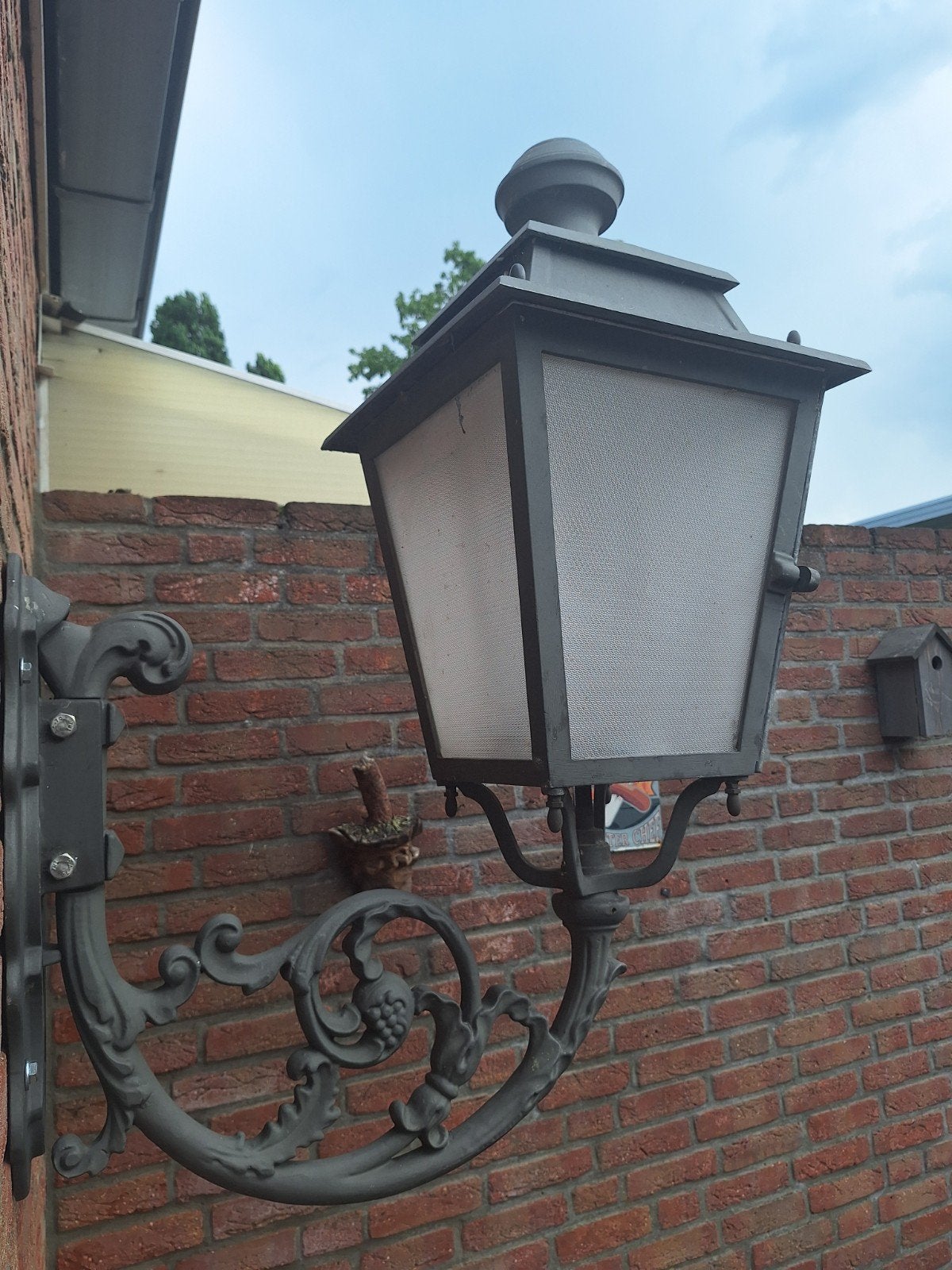 Originele smeedijzeren straatlantaarn uit Sittard Geleen, Ophalen