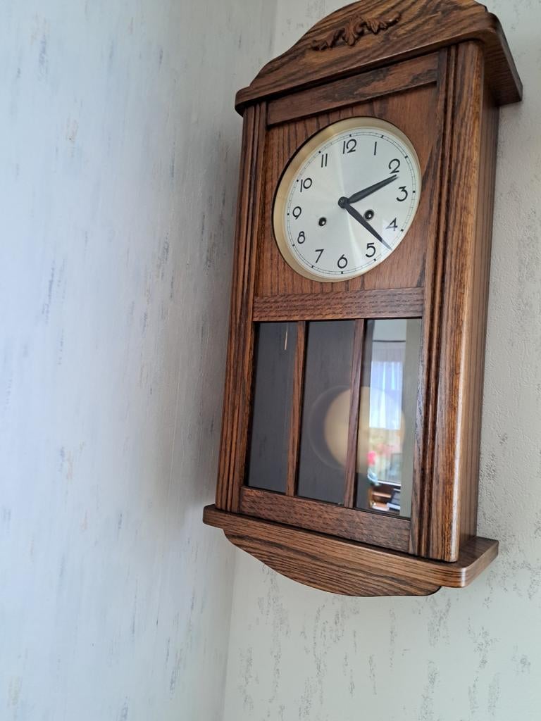 Houten muurklok, Ophalen