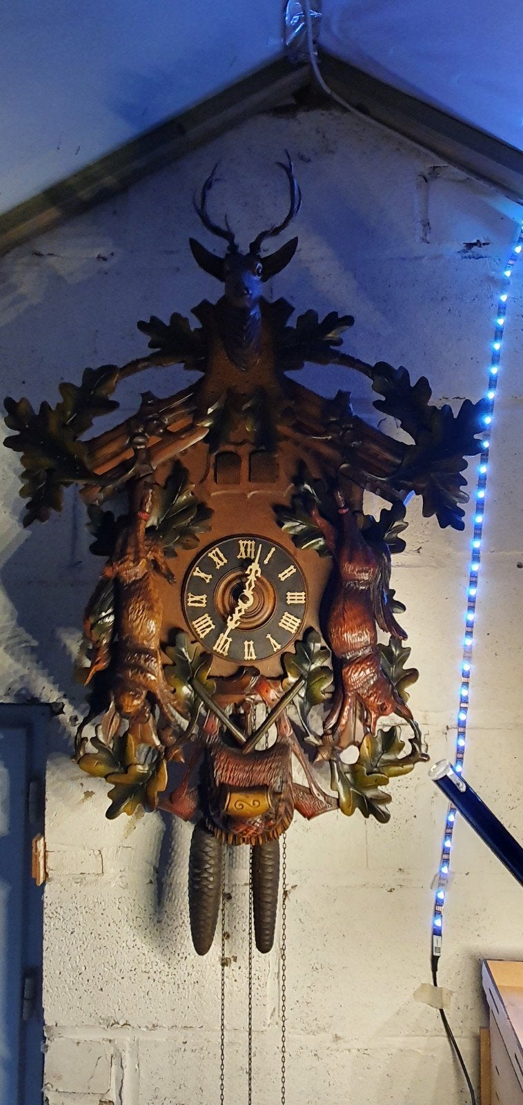 Antieke Koekoeksklok met kwartel Jachttafereel en hertenkop, Antiek en Kunst, Antiek | Klokken, Ophalen of Verzenden