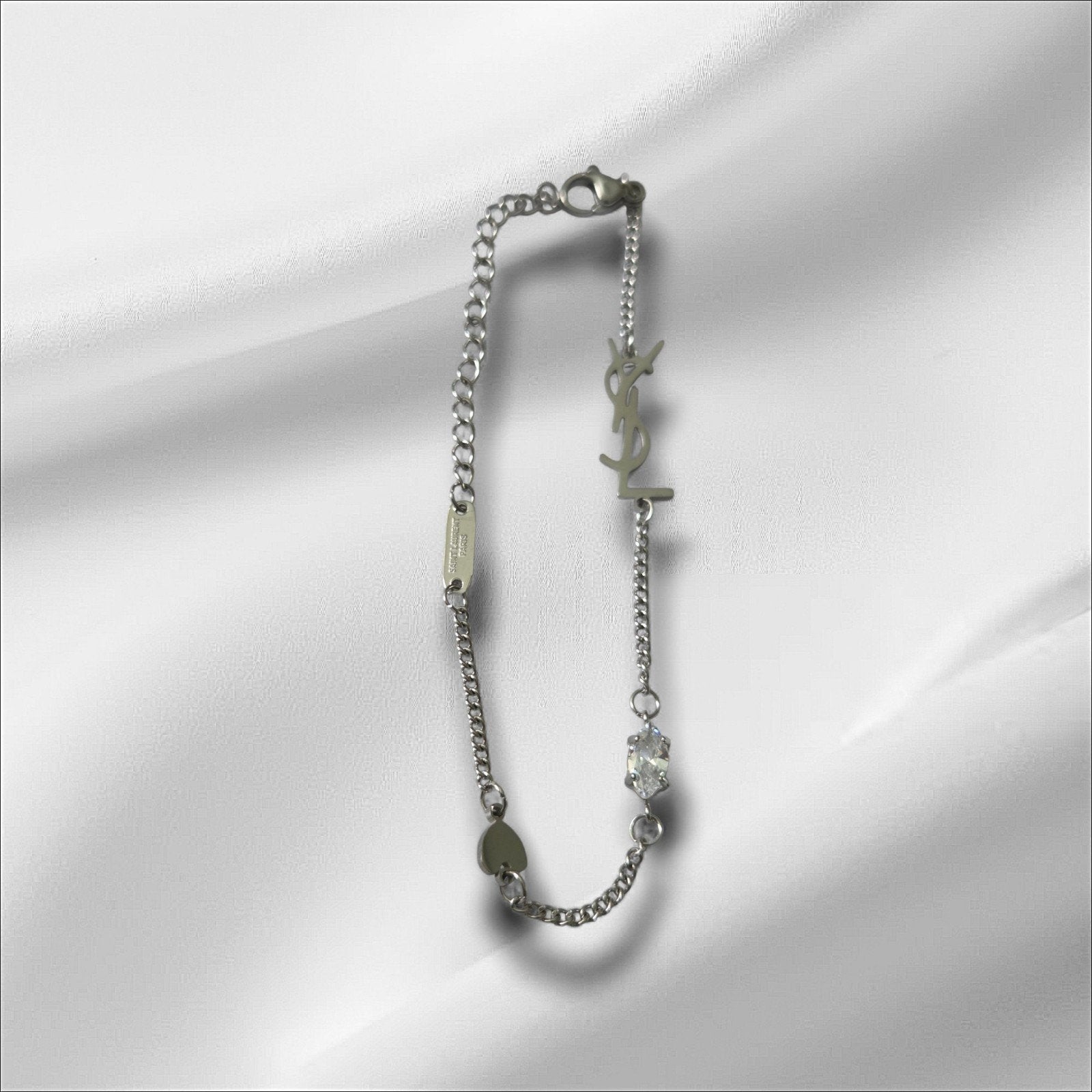 YSL Yves Saint Laurent armband zilver, Sieraden, Tassen en Uiterlijk, Armbanden, Staal, Nieuw, Ophalen of Verzenden, Zilver