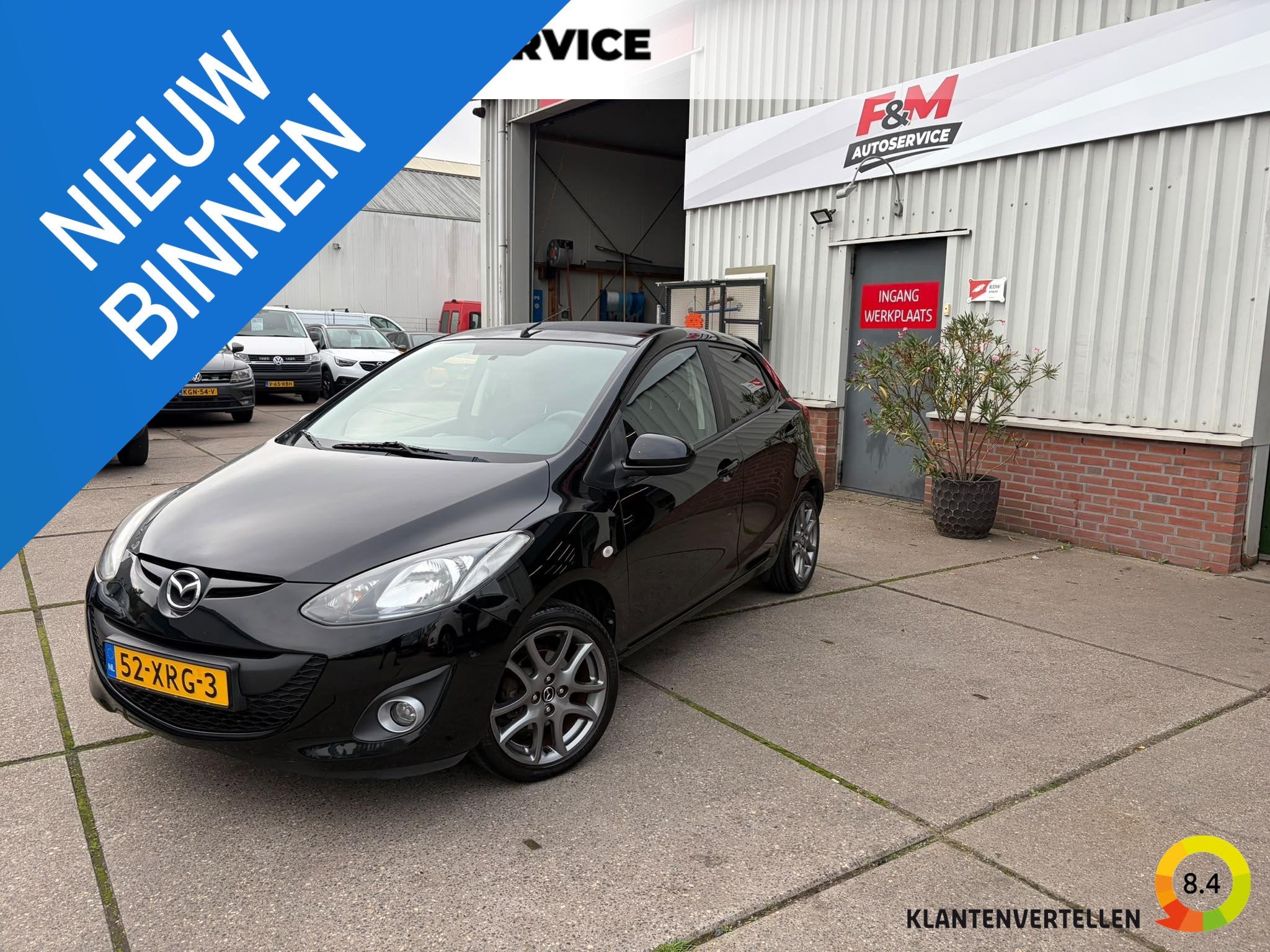 Mazda 2 1.3 Navigator GT BIFUEL, Airco, navi, stoelverwarmin, Voorwielaandrijving, Euro 5, Stof, Zwart