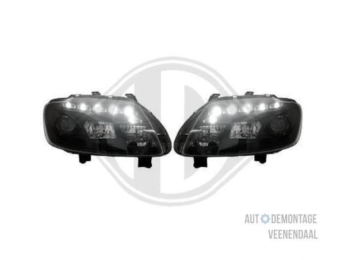 Koplampset links + rechts van een Volkswagen Caddy, -, Volkswagen, -, Nieuw
