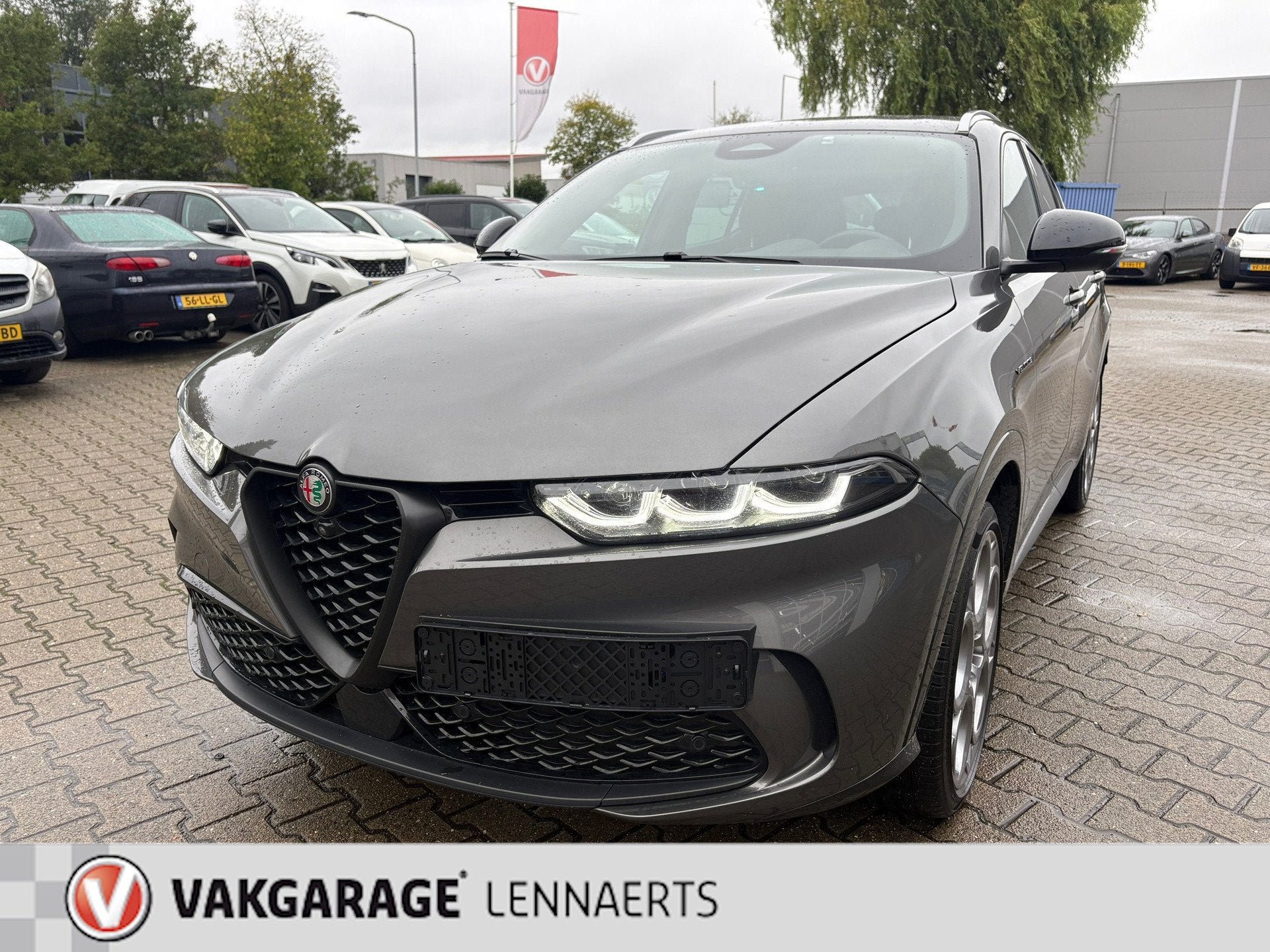 Alfa Romeo Tonale 1.3T PHEV Veloce 280PK (RIJKLAAR BOVAG), Auto's, Automaat, 12 maanden, Gebruikt, Zwart