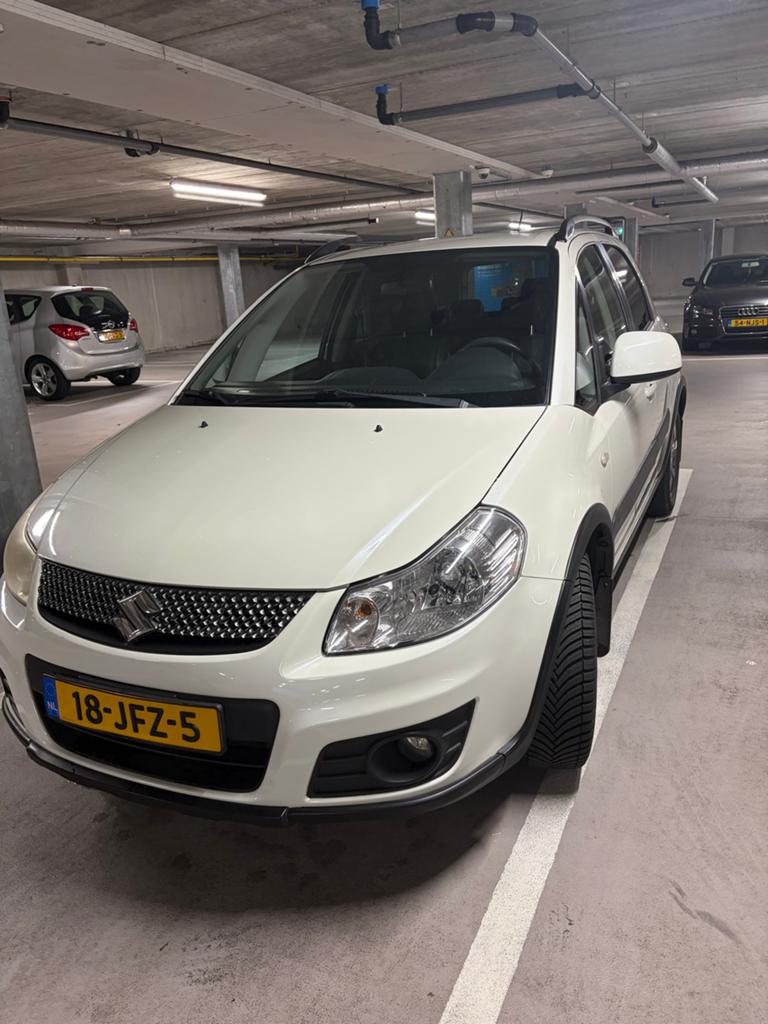 Suzuki SX4 1.6 79KW 2009 Wit, Auto's, Suzuki, 15 km/l, 4 cilinders, Origineel Nederlands, 1200 kg