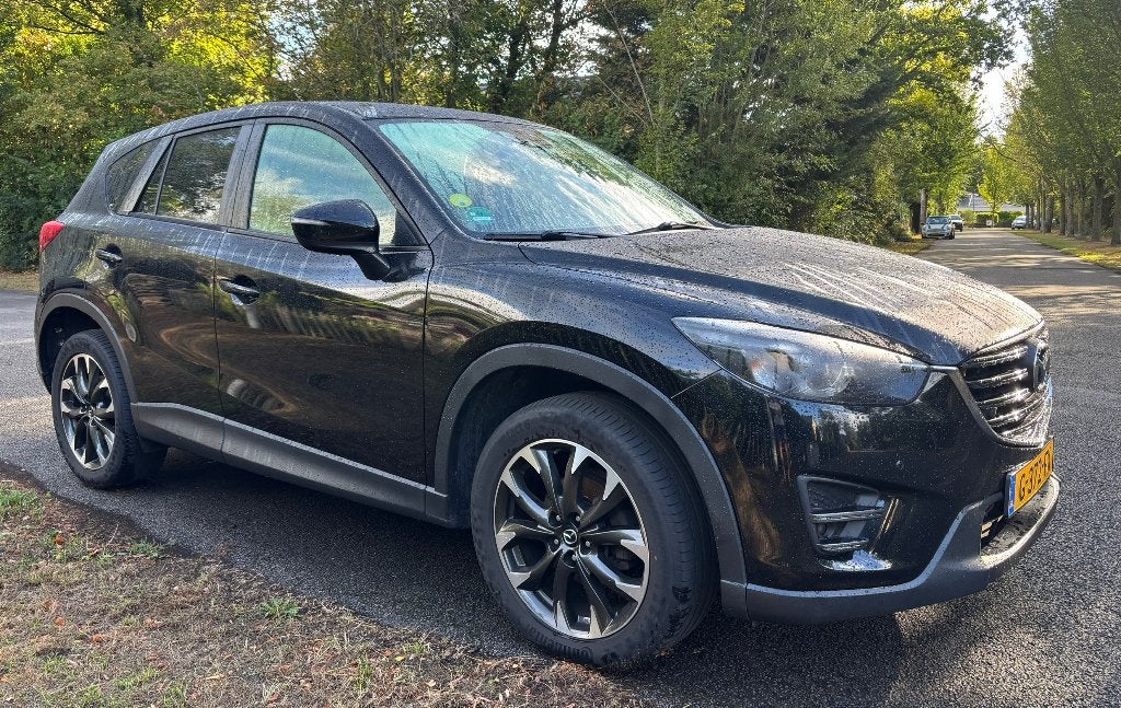 Mazda CX-5 2.2 Skyactiv 129KW 4WD 2015 Zwart, Auto's, Mazda, Dealer onderhouden, Stof, 4 cilinders, 2000 kg