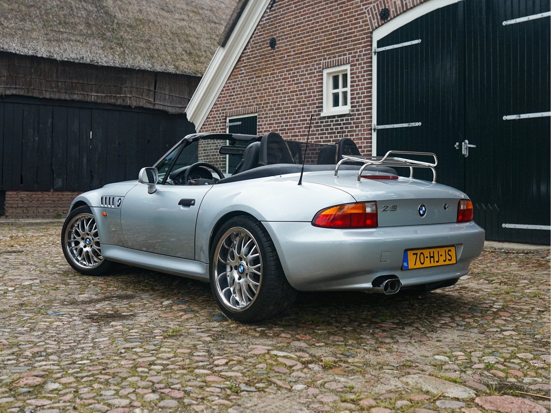 BMW Z3 Roadster 2.8 Widebody AC Schnitzer l Sportstoelen l E, Auto's, Oldtimers, Achterwielaandrijving, Zwart, 192 pk, Cabriolet