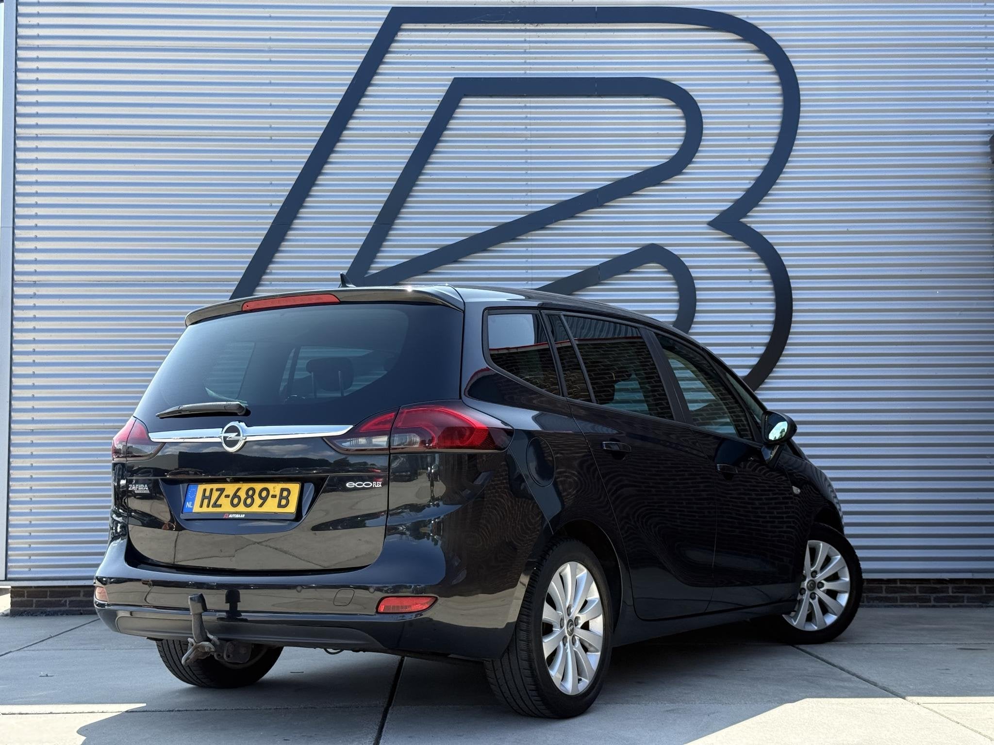 Opel Zafira Tourer 1.4 Cosmo 7p. 1e Eigenaar|Camera|Trekhaak, Auto's, Opel, Euro 5, Stof, Gebruikt, Zwart