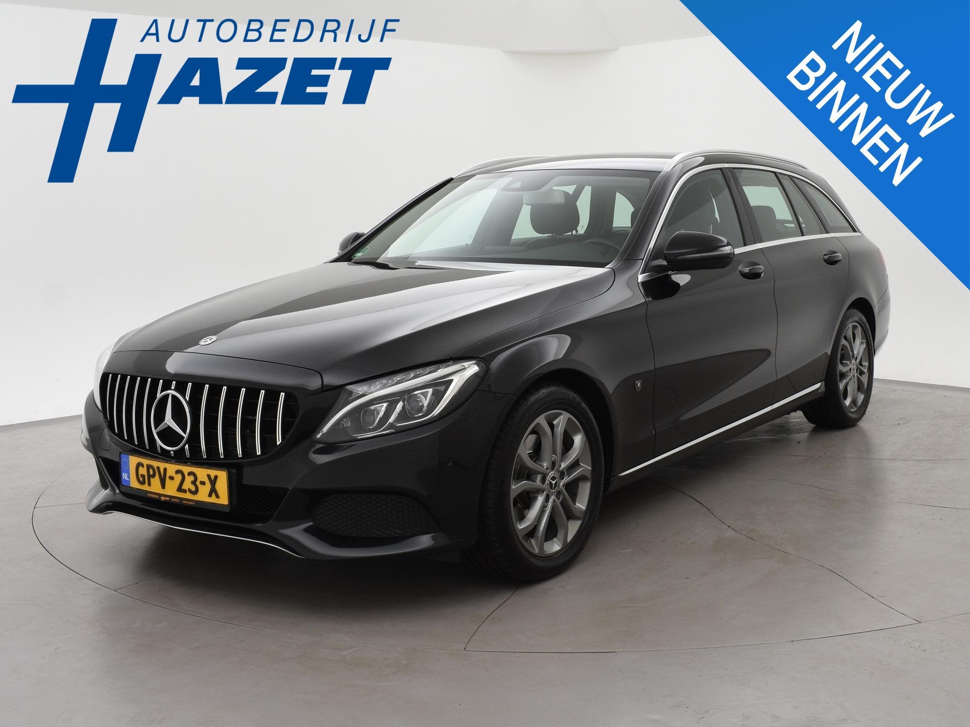 Mercedes-Benz C-klasse Estate 200 184 PK AUT. AMG SPORT PREM, Achterwielaandrijving, 4 cilinders, Leder en Stof, Zwart