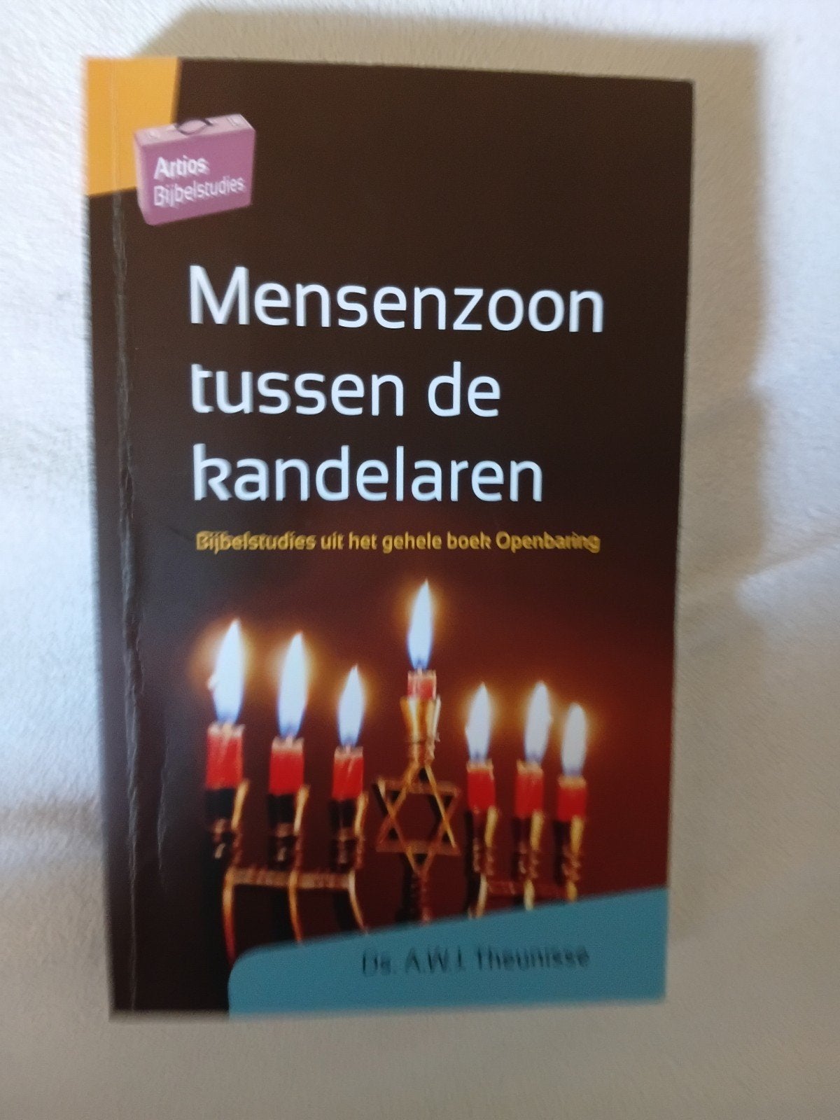 A.W.J. Theunisse - Mensenzoon tussen de kandelaren, Ophalen of Verzenden, Zo goed als nieuw, A.W.J. Theunisse