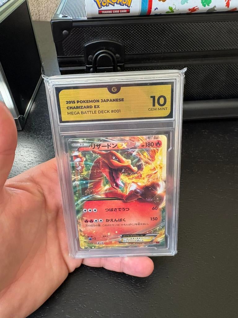 Charizard ex battle deck grade 10, Ophalen of Verzenden, Zo goed als nieuw, Meerdere kaarten, Foil