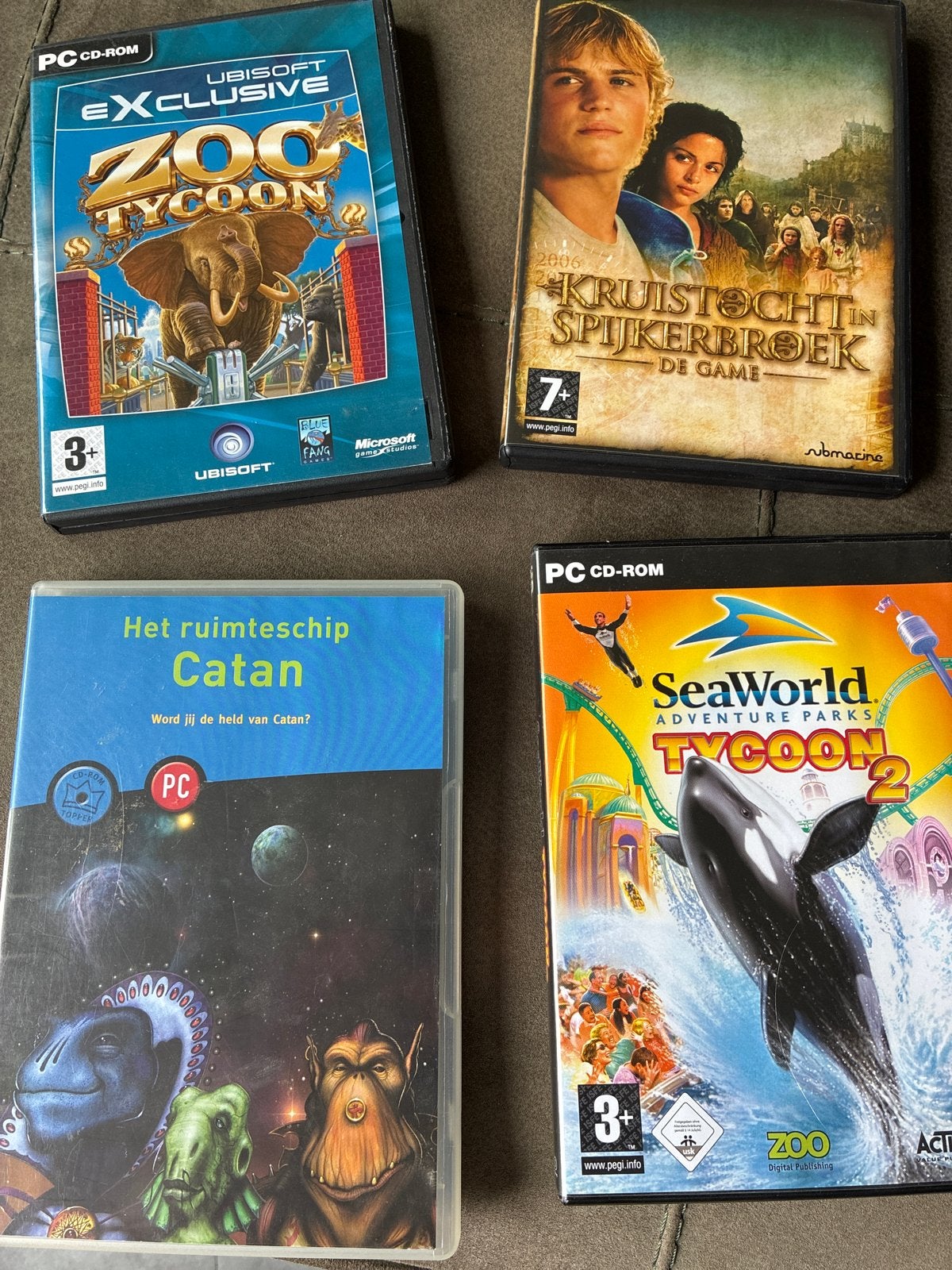 PC CD-ROM Spellen Bundel: Zoo Tycoon, Catan, SeaWorld, Kruis, Gebruikt, 1 speler, Ophalen of Verzenden, Vanaf 3 jaar