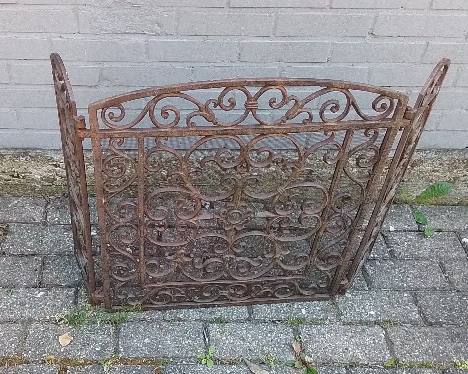 Antiek smeedijzeren haardscherm met sierlijke krullen, Ophalen of Verzenden