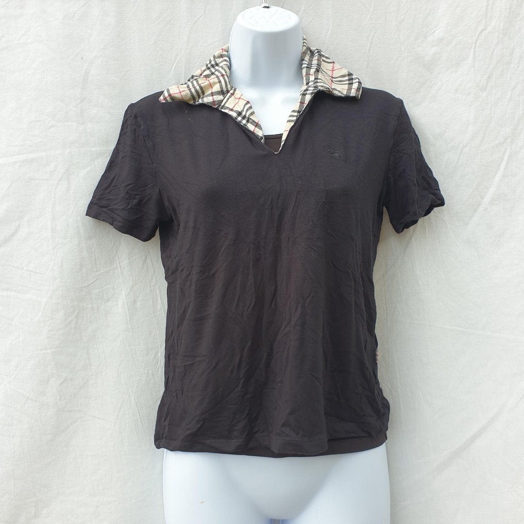 Stoere zwarte dames polo mt M merk Burberry London, Kleding | Dames, Maat 38/40 (M), ., Zwart, Ophalen of Verzenden