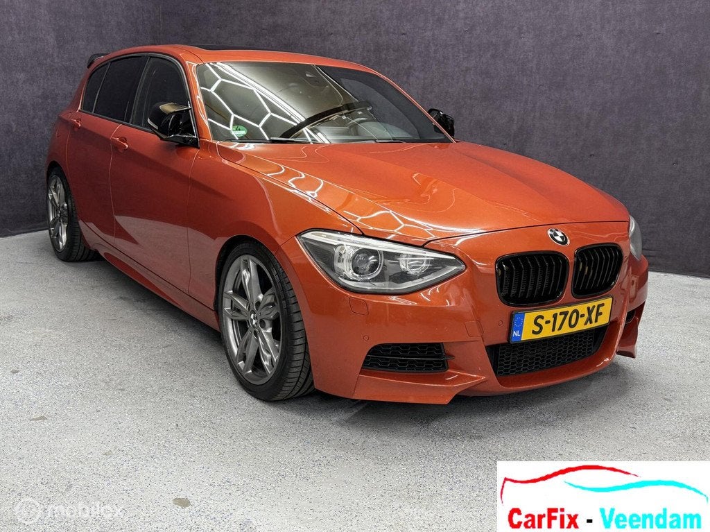 BMW 1-serie M135i xDrive Business+, Auto's, Euro 5, Overige kleuren, 320 pk, Leder