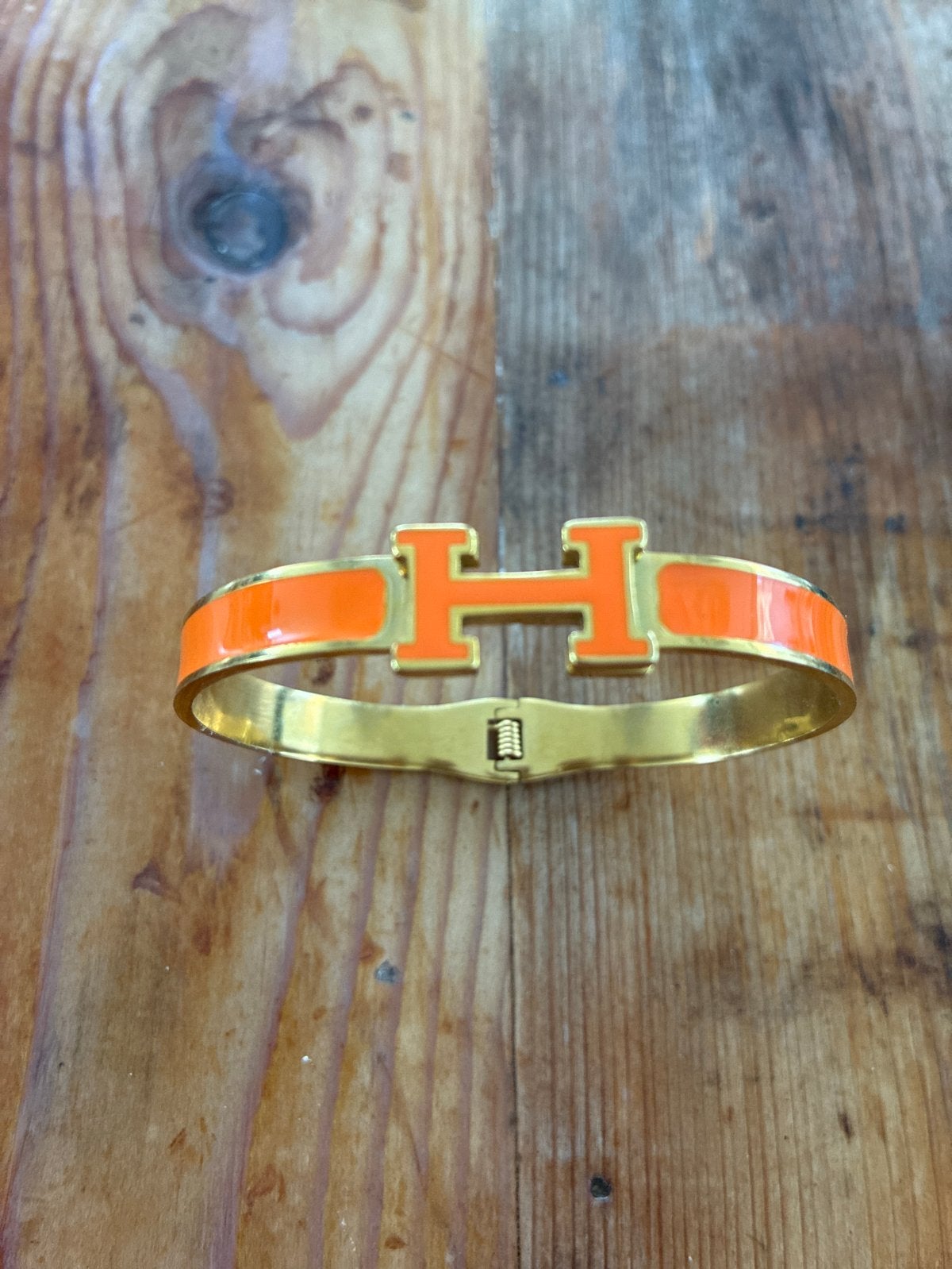 Armband met veersluiting, Oranje met Goud, unisex-maat., Verzenden, Zo goed als nieuw, Oranje, Kunststof of Plastic