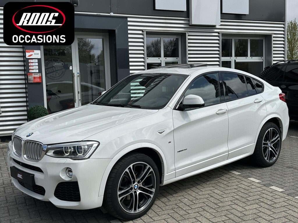 BMW X4 xDrive35i High Executive, Auto's, BMW, Automaat, Stof, Gebruikt, Euro 6