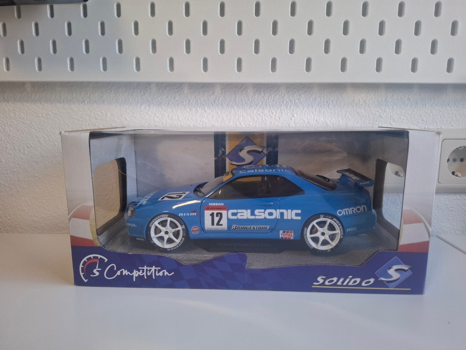 Solido - Nissan Skyline GT-R R34 Calsonic, Hobby en Vrije tijd, Modelauto's | 1:18, Verzenden, Gebruikt, Auto, Solido