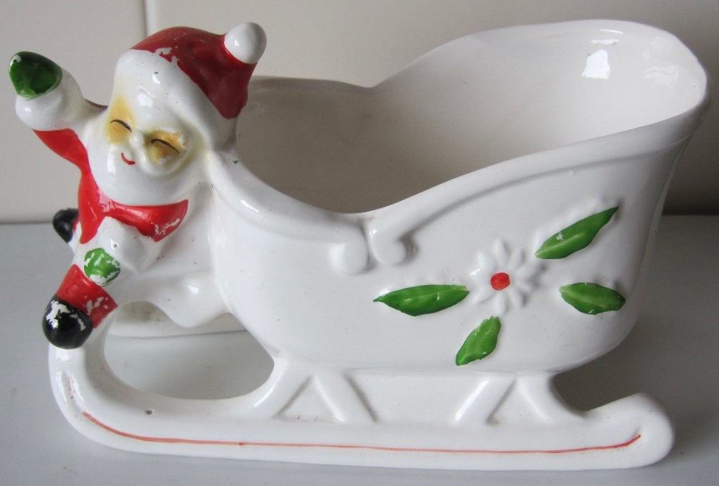 bloempotje in de vorm van een kerstman op een arrenslee, Diversen, Kerst, Ophalen of Verzenden, Gebruikt