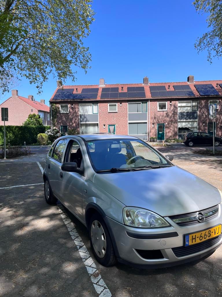 Opel Corsa 1.2 16V 5D 2005 Grijs, Auto's, Voorwielaandrijving, 450 kg, 4 cilinders, 1229 cc