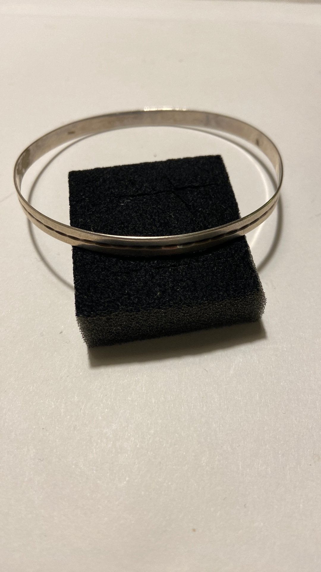 Rinkel amband zilver gemerkt 900  7 cm doorsnee, Ophalen of Verzenden, Zilver, Armband