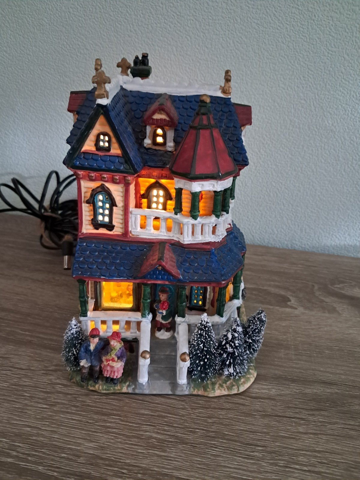 kersthuisje voor in een kerstdorp, Ophalen