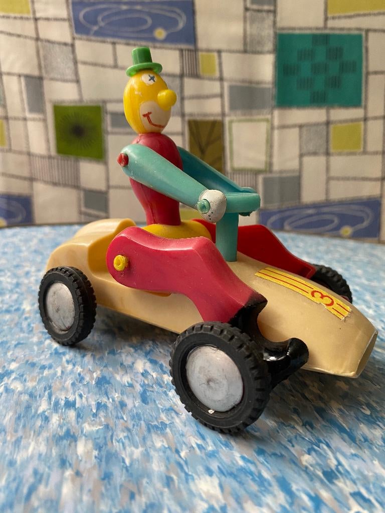 Vintage speelgoed, clown in racewagen, made in Hong Kong, Ophalen of Verzenden