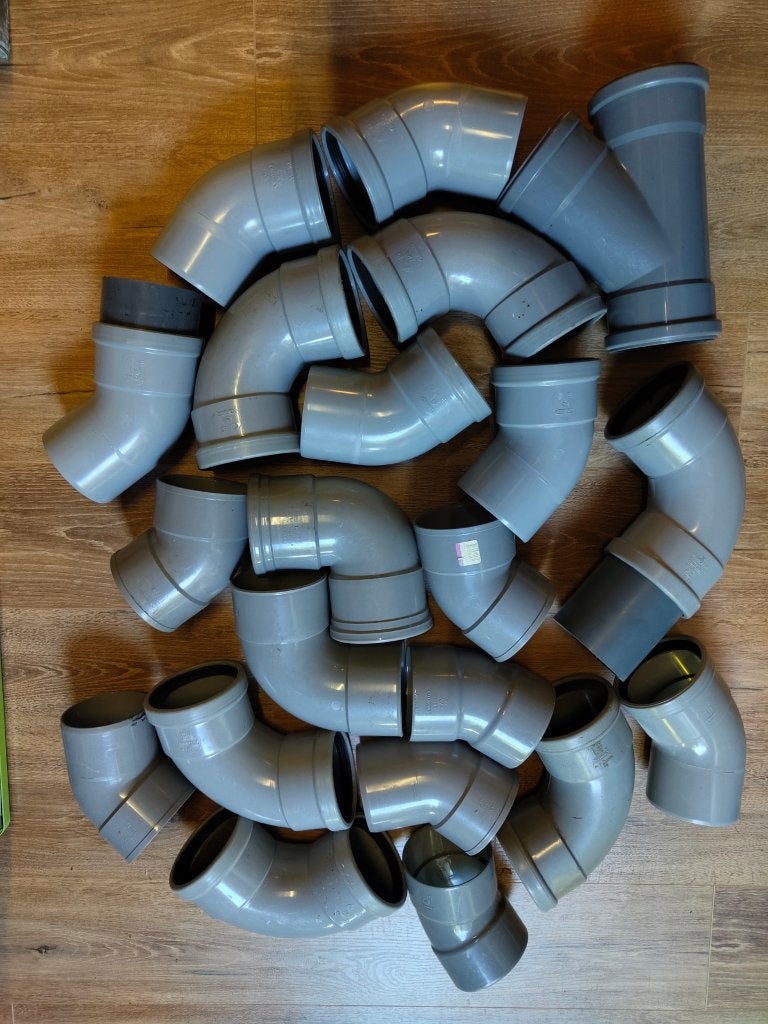 Pakket diverse PVC koppelingen 110mm, Ophalen, Bochten, Pvc, Zo goed als nieuw