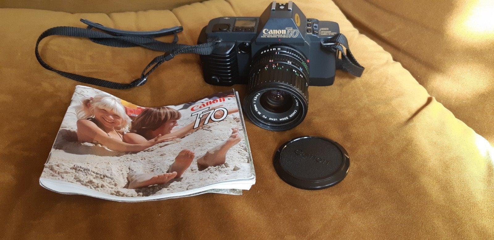 Canon T70 zgan met boekje en lens, Audio, Tv en Foto, Ophalen of Verzenden, Zo goed als nieuw, Spiegelreflex, Canon
