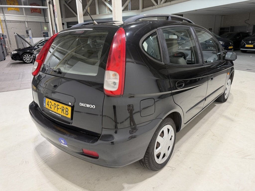 Daewoo Tacuma 1.6-16V Style, Auto's, Voorwielaandrijving, Stof, Zwart, Origineel Nederlands