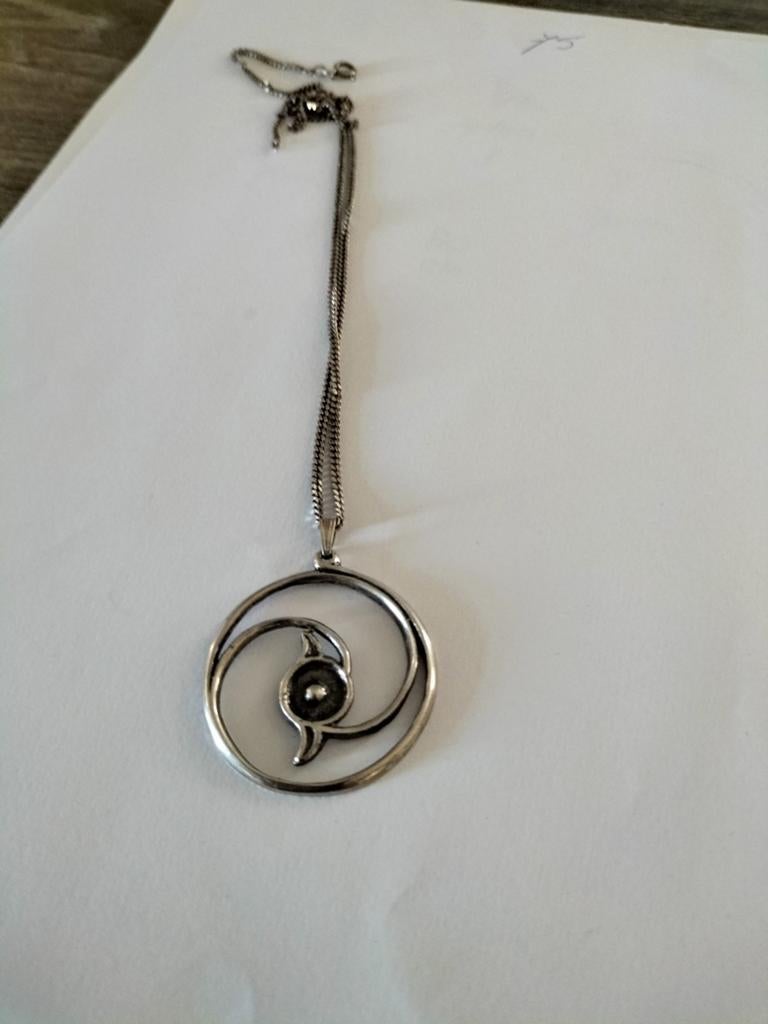Zilveren ketting met spiraal hanger met een kop van een voge, Met hanger, Gebruikt, Verzenden, Zilver