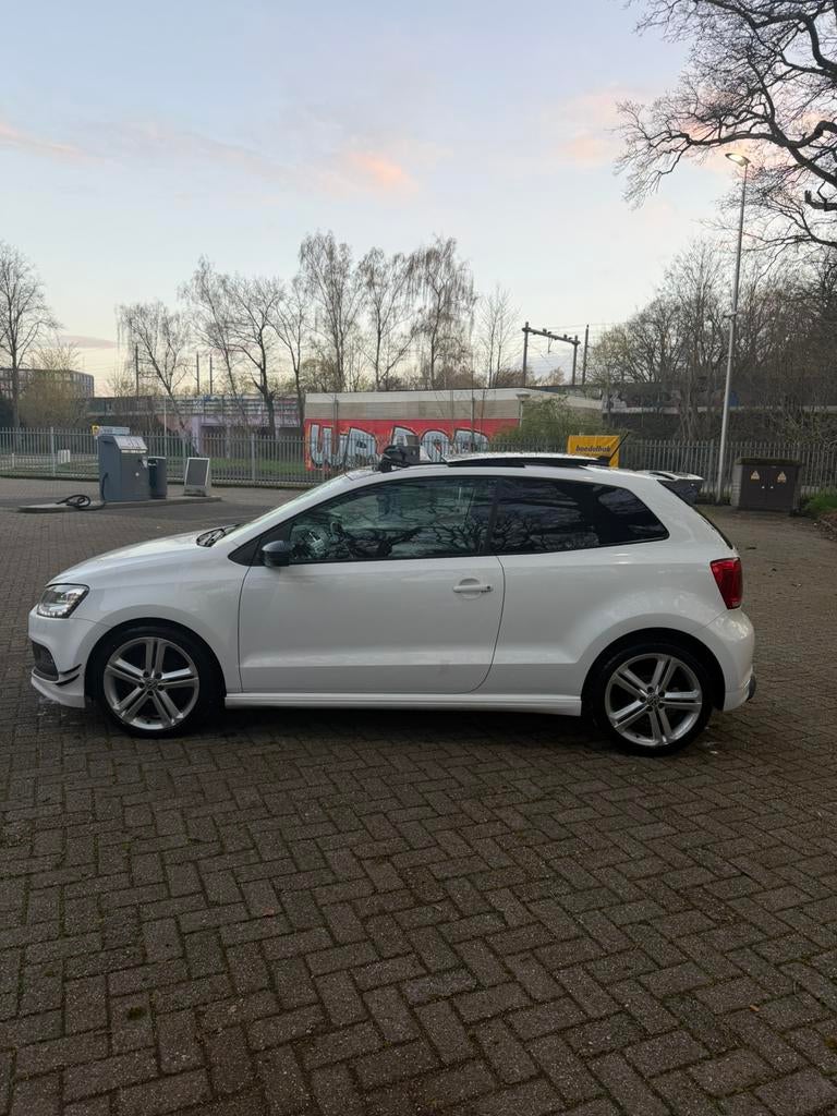 Volkswagen Polo 1.2 TSI DSG R-line, Stof, 40 €/maand, Zwart, 4 cilinders