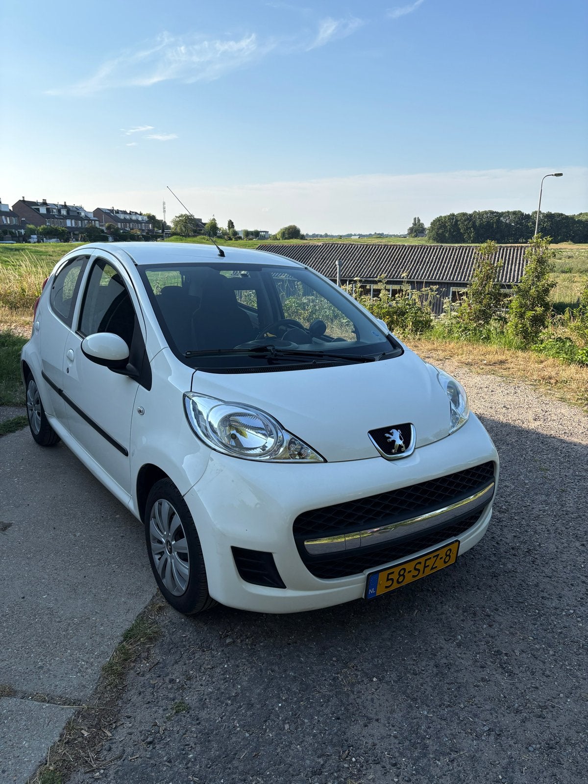 Peugeot 107 1.0 12V 5DR 2011 Wit, Voorwielaandrijving, Stof, Zwart, Airconditioning