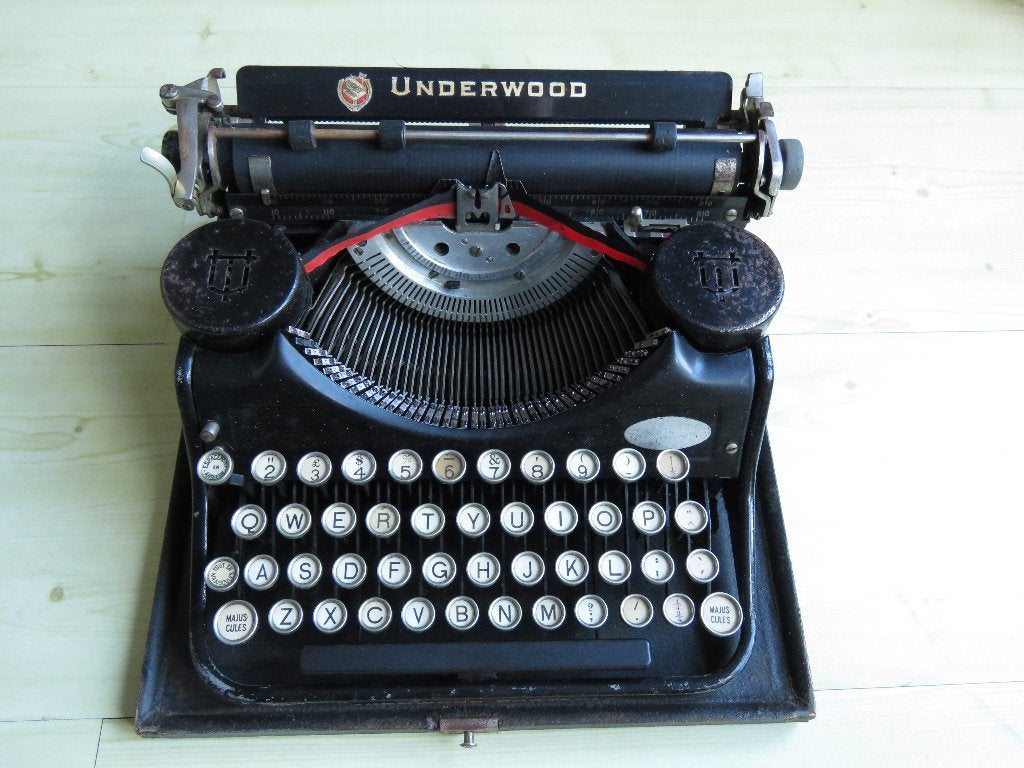 Antieke Underwood portable typemachine, Ophalen
