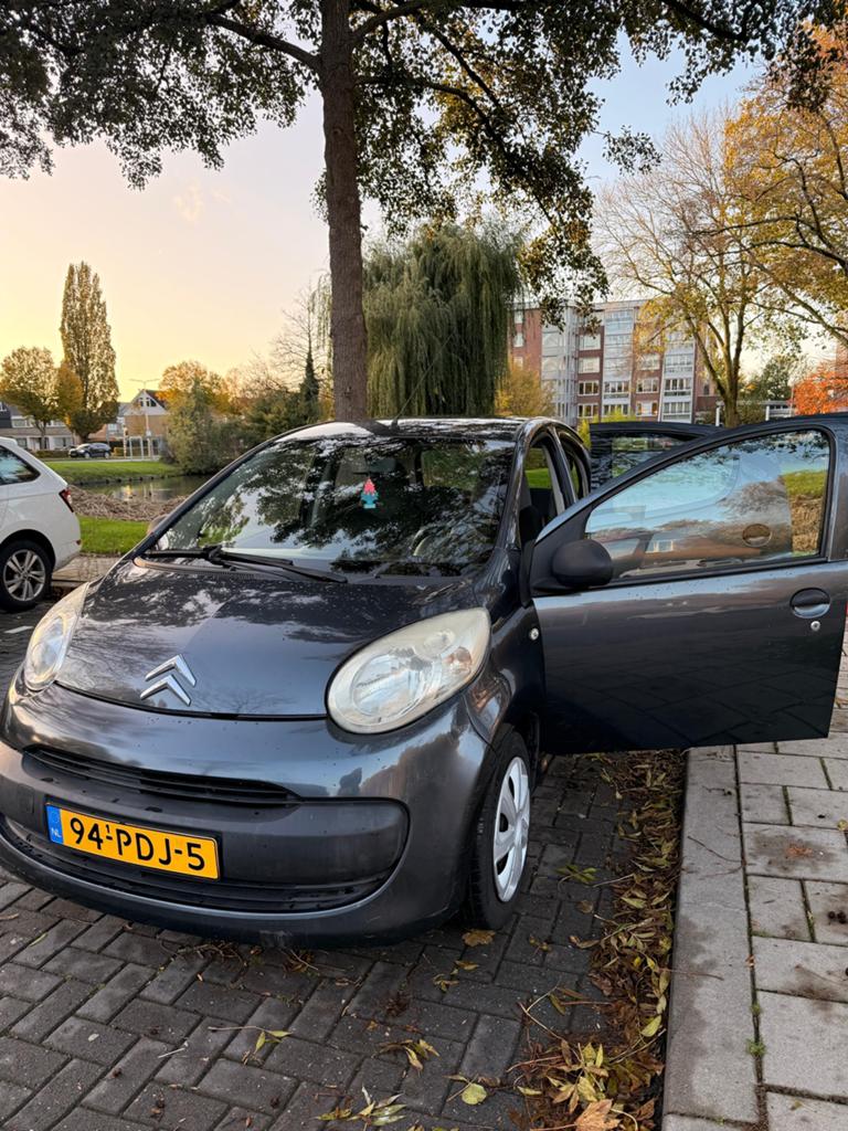 Citroën C1 1.0i 68PK 5D 2011 Grijs, Voorwielaandrijving, Stof, Airbags, 4 stoelen