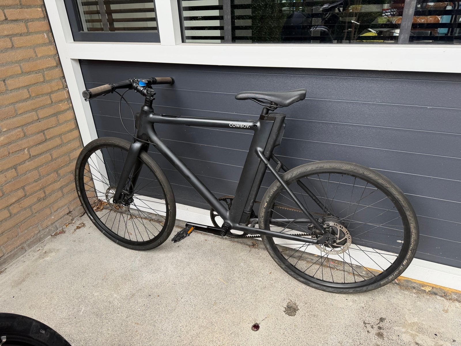 Cowboy 1 E-bike - Mat Zwart (1e model), Ophalen, Gebruikt, 51 tot 55 cm, 30 tot 50 km per accu