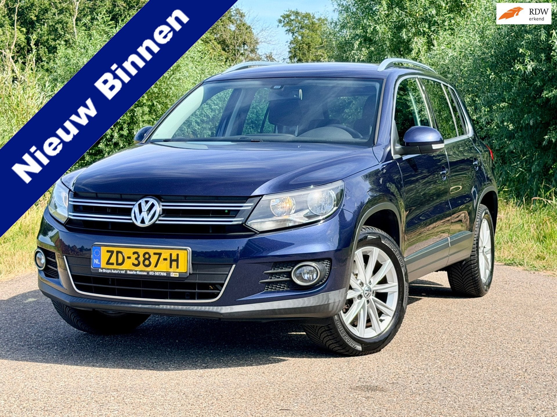 Volkswagen Tiguan 1.4 TSI Sport&Style 4motion Clima PDC Trek, 13 km/l, Euro 5, Gebruikt, Zwart