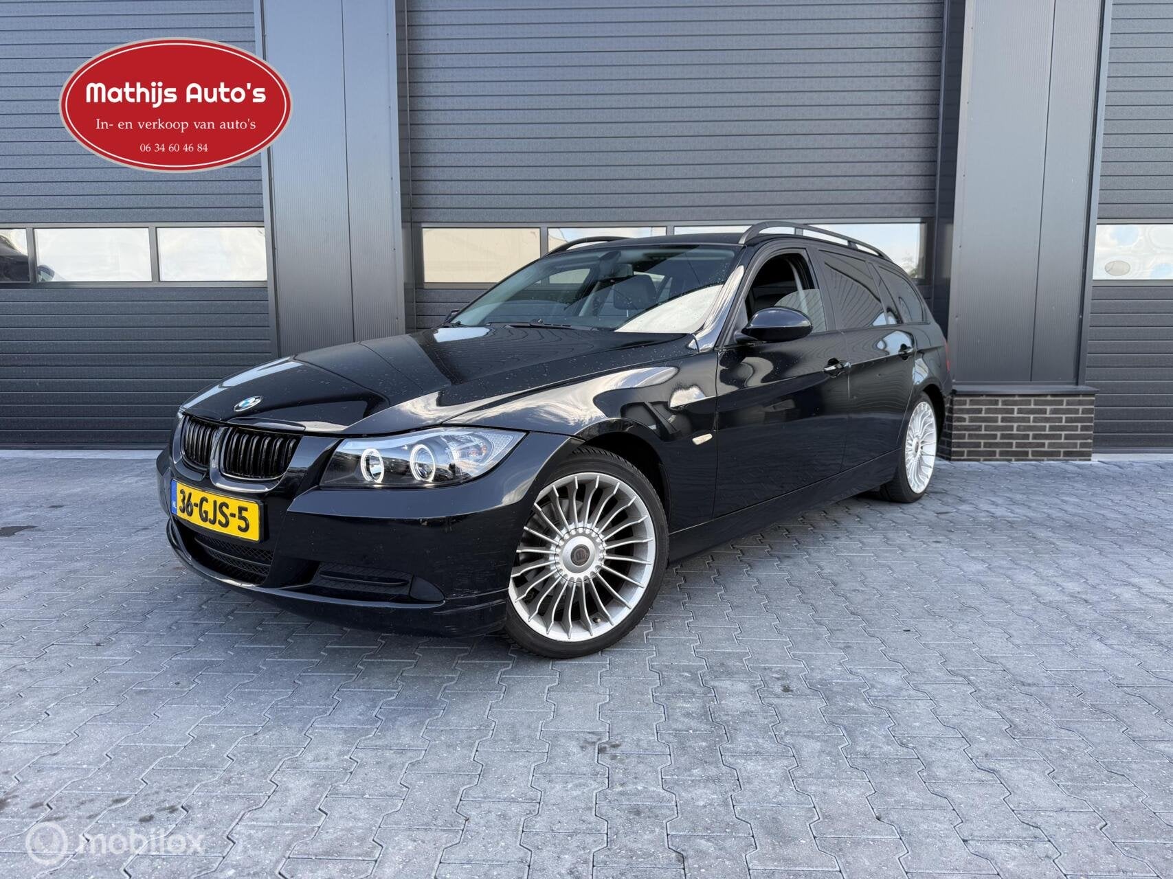 BMW 3-serie Touring 318i Executive Leder Clima Navi!, Auto's, Achterwielaandrijving, Zwart, Origineel Nederlands, Handgeschakeld
