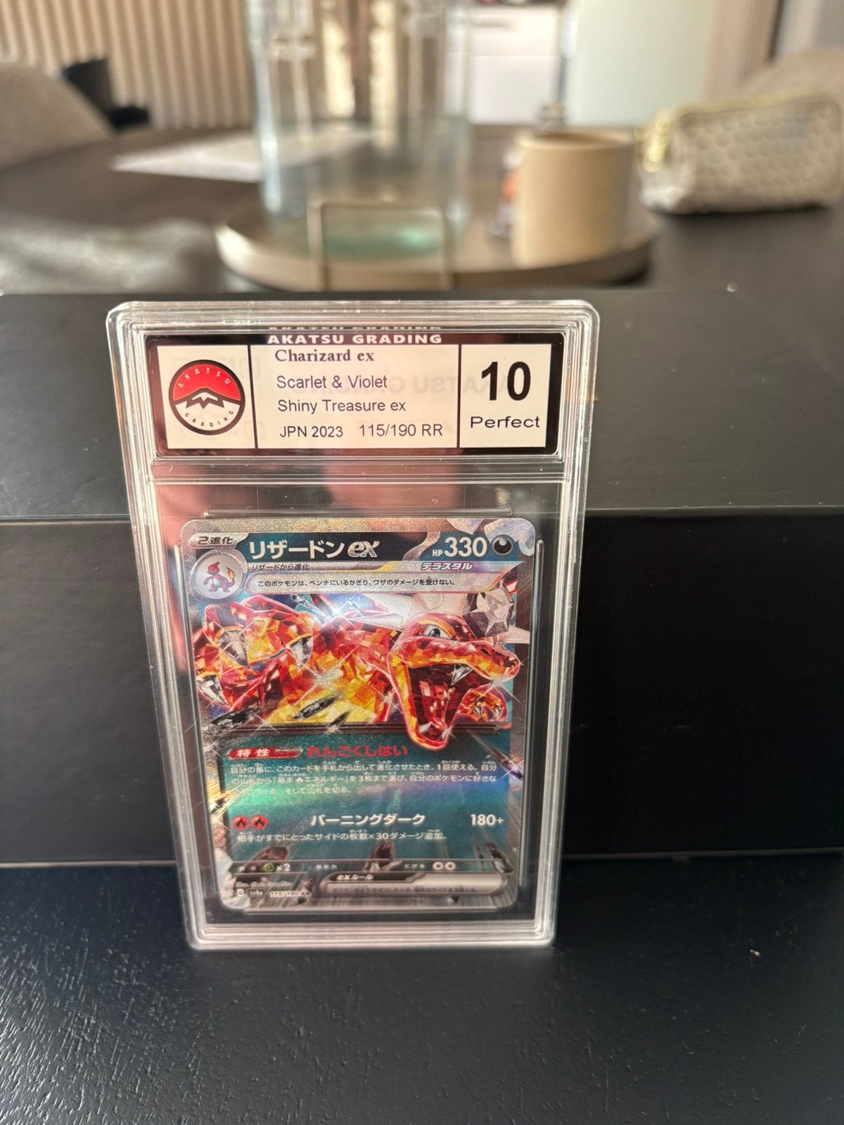 Charizard ex grade 10, Ophalen of Verzenden, Zo goed als nieuw, Meerdere kaarten, Foil