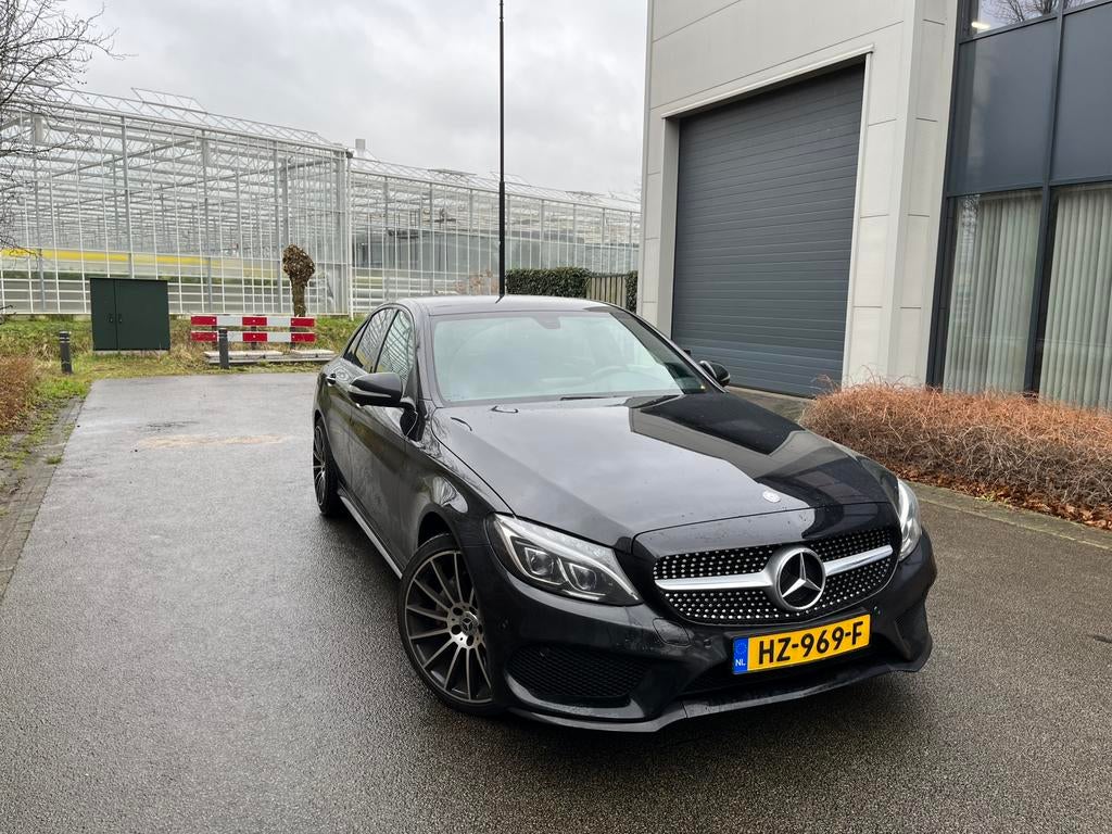 Mercedes-Benz C-Klasse C180 1.6 115KW Aut7 2014 Zwart, Auto's, Mercedes-Benz, Automaat, 1800 kg, Zwart, USB
